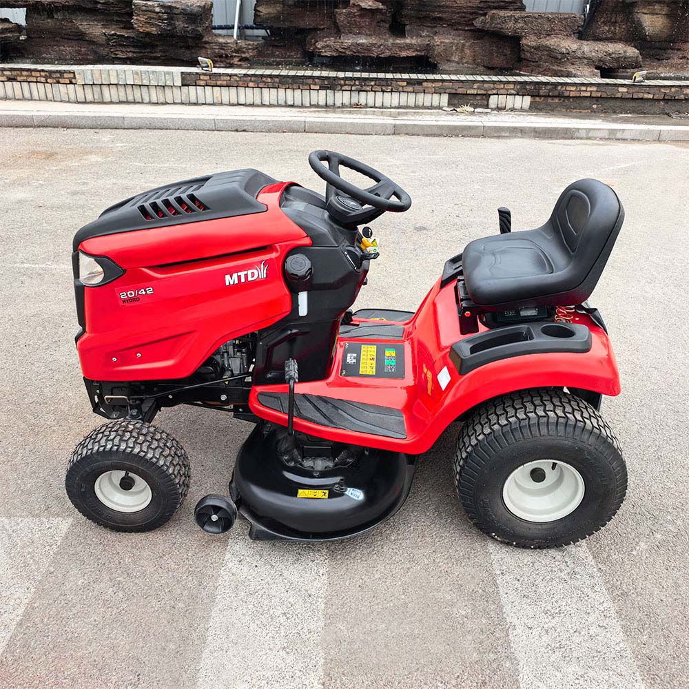 सवारी लॉन घास काटने की मशीन